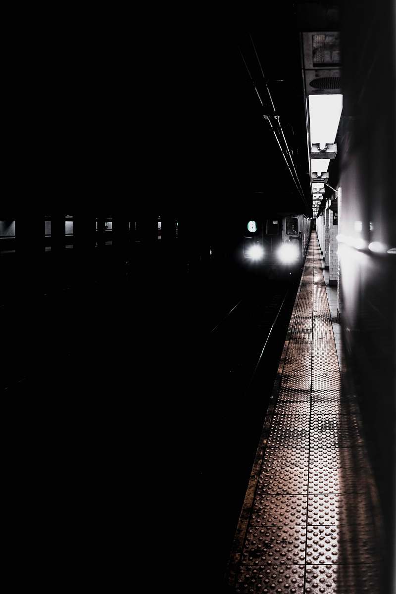 tunnel narrow pathway across building canal street
